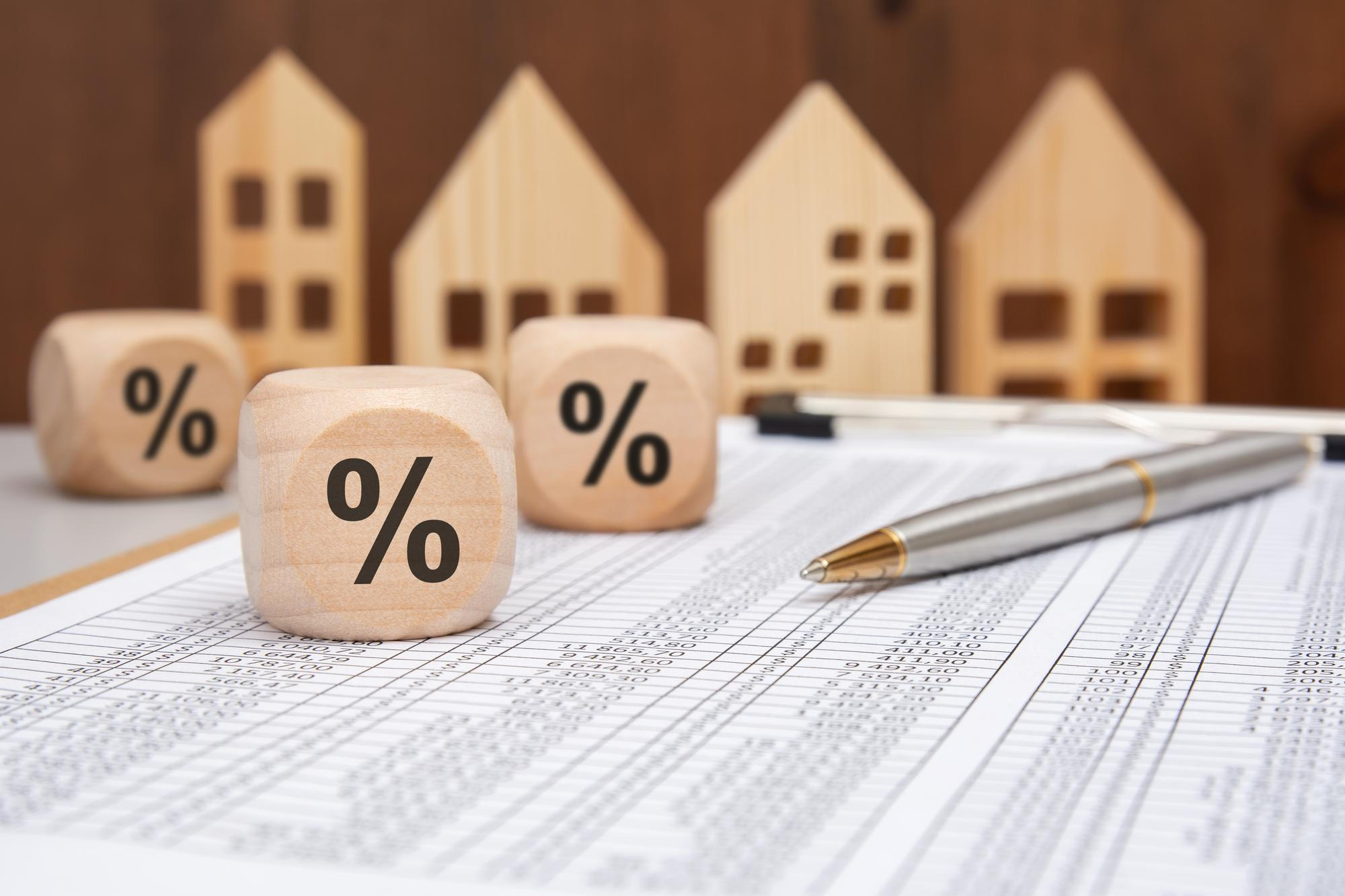 What costs besides the apartment price should be considered?